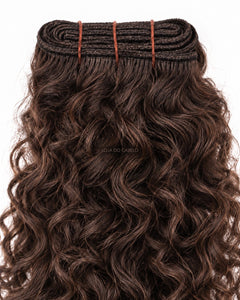 Detalhe de cabelo em Banda Cacheado
